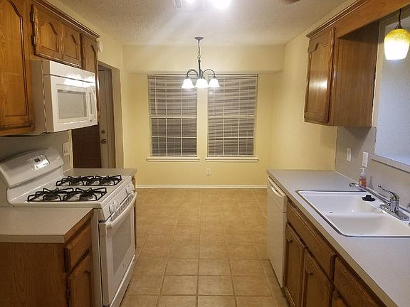 Kitchen looking into eating area. All appliances recently updated