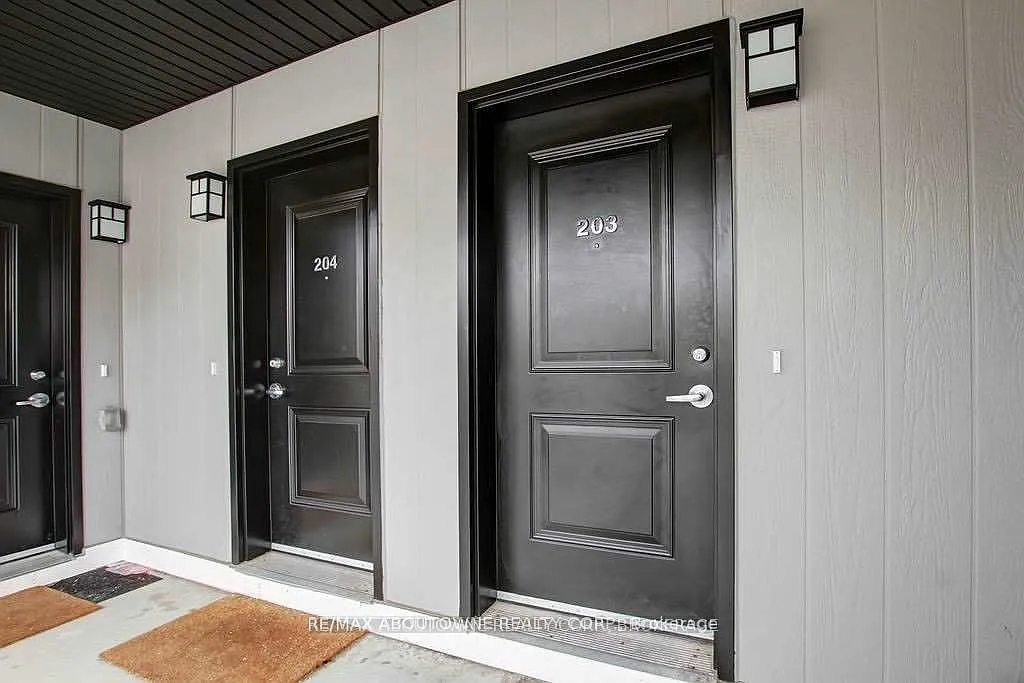 Building Photo - 1202 Main St E #203