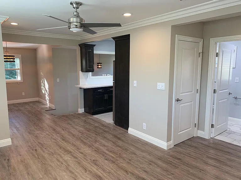 Studio as seen from the SE corner. Bathroom is on the right. On the far left is the dining area.