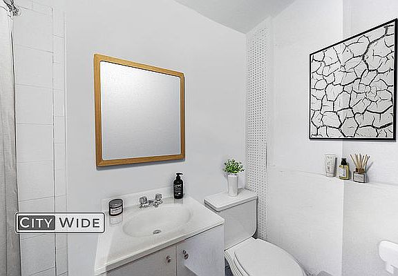 3rd image of 309 E 9th St APT 2D