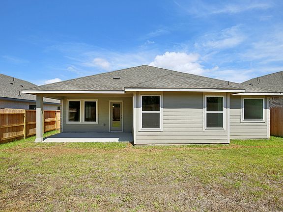 A backyard in a home in Stewart s Ranch of Conroe, TX.