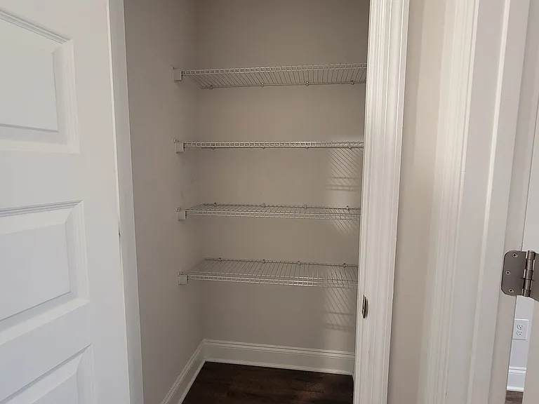 Upstairs walk-in linen/storage closet
