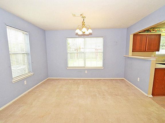 VIEW FROM DEN TO FORMAL DINING ROOM