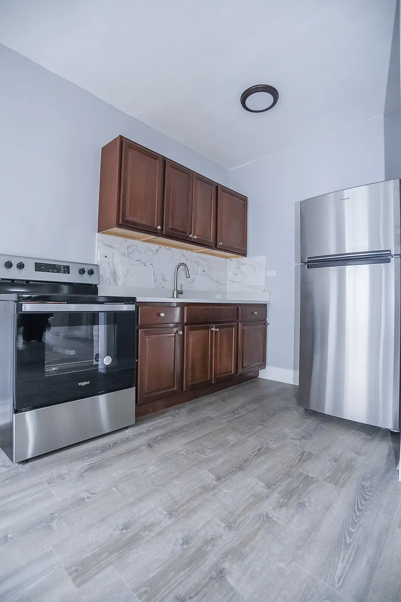 Building Photo - 6956 N Ashland Blvd #306