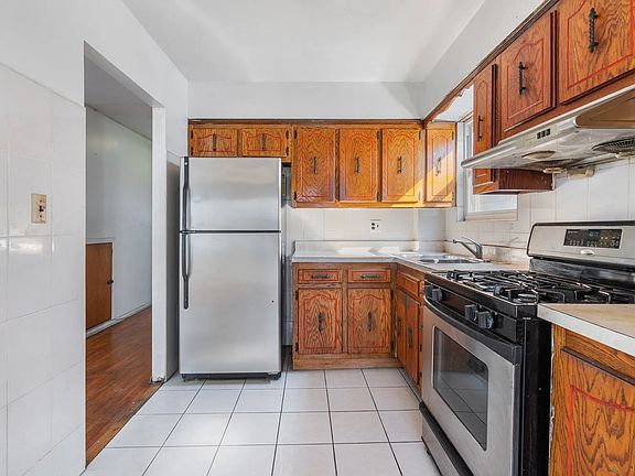 4th image of 66-11 52nd Dr #1