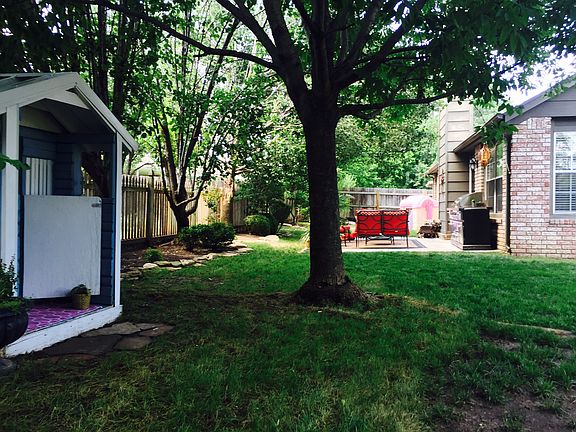 Back yard with mature trees