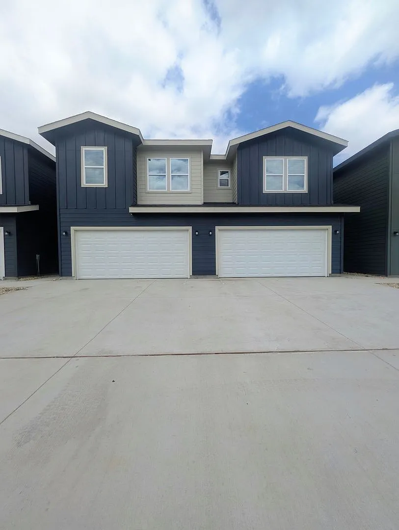 Brand New Duplex in New East Parks Community — Photo 1