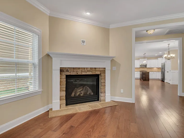 The gas fireplace is enclosed and vented to the outside