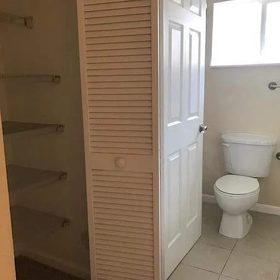 Guest bathroom and linen closet
