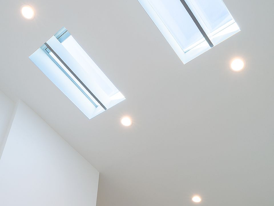 2 large operable skylights in living room