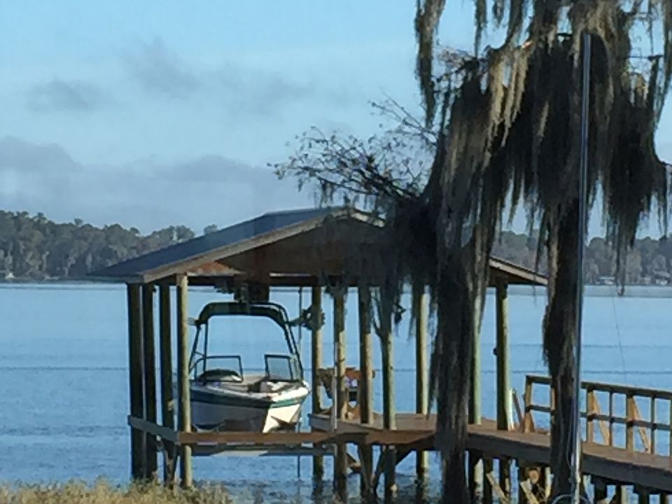 Covered dock with boat lift