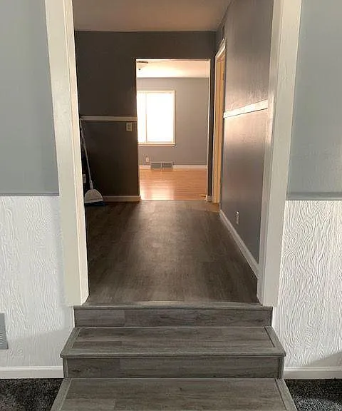 Step down into family room from kitchen.