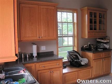 Custom built maple cabinets throughout the kitchen