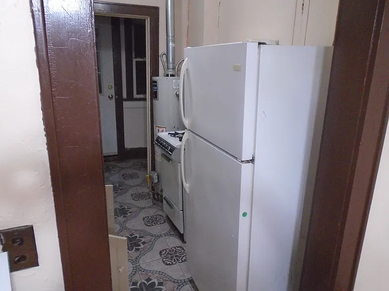Close view into he kitchen of 124 NW 31st Street