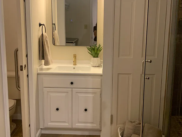 new sink, mirror,and lighting