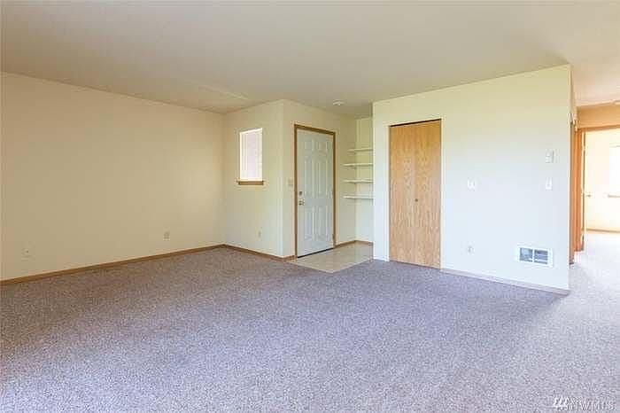 living room entrance and small closet