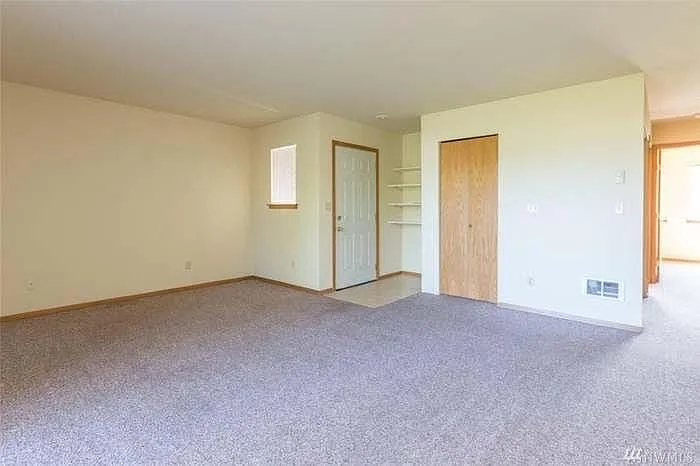 living room entrance and small closet