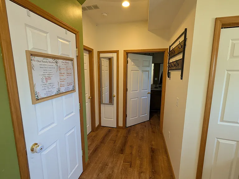 Doors Left to Right: Pantry, 1st Bedroom, Linen Closet, Main Bathroom
