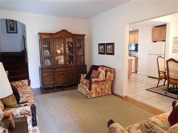 Living Room opens into Formal Dining Room