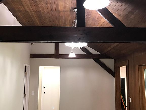 Dining room to kitchen, bath and hallway.