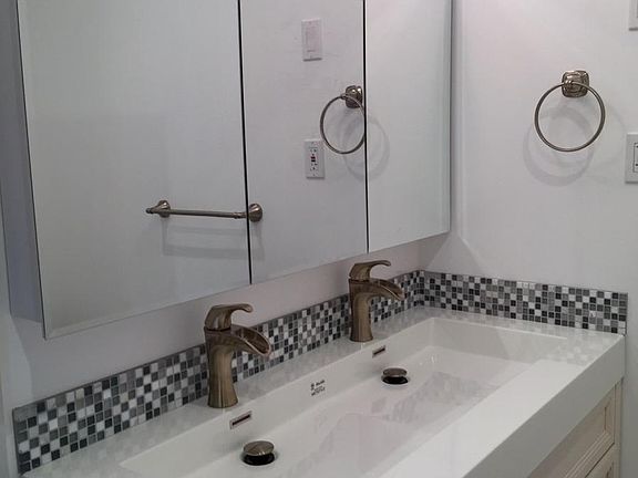 new bathroom with marble tile