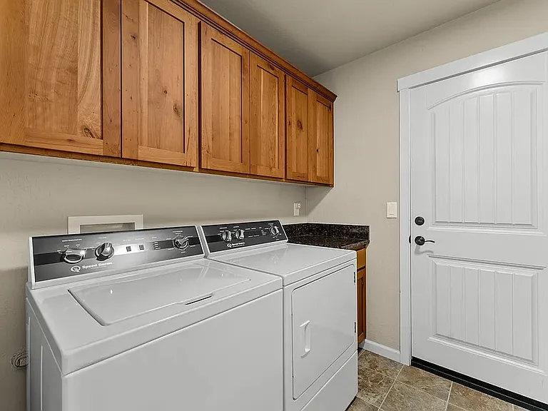 Mud room / laundry located off garage entrance.