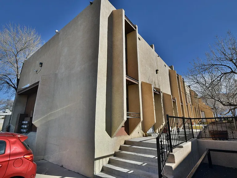Westwind Apartments a 22-unit townhome community. Excellent northeast heights location!
