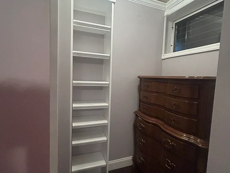 2nd bedroom walk in closet with built ins (optional dresser)