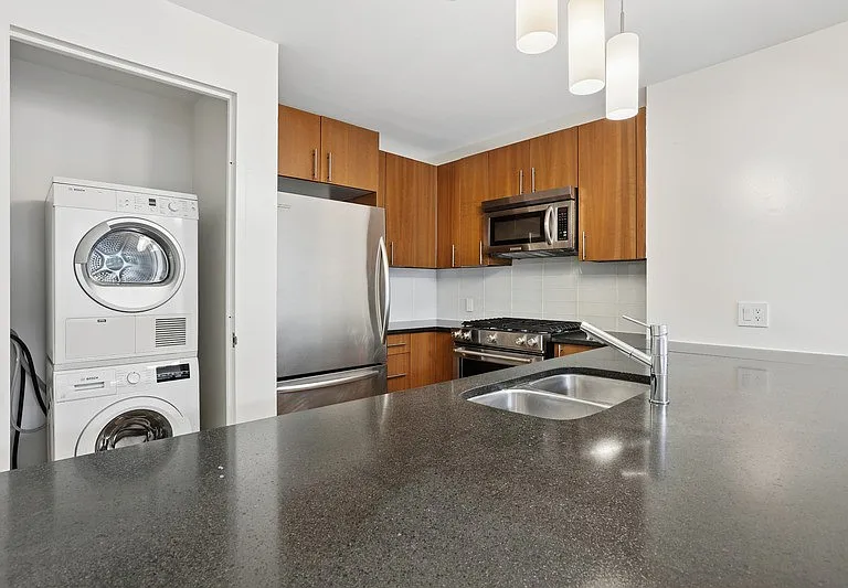 Elevate your living with Arboras modern kitchen featuring sleek appliances, stylish cabinetry, and a spacious layout perfect for culinary creations. Ready to make this your new home? Reach out for more details today!