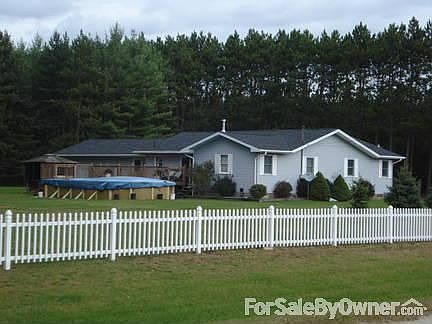 Back side of house : Shows the pool and hot tub with gazebo