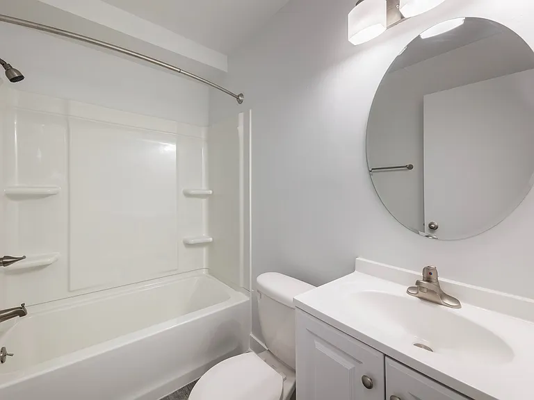 Spacious Bathrooms with Contemporary Lighting