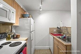 galley kitchen with pass through