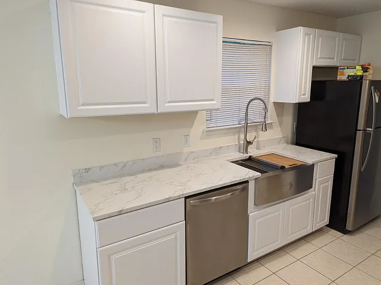 9608 Brentwood Blvd — Photo 2