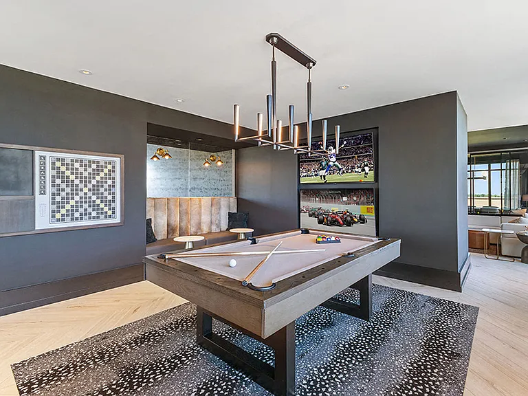 Indoor/ outdoor Sky Lounge with billiards and lounge seating