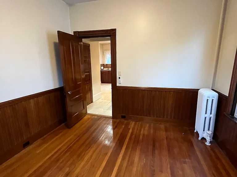 First floor bedroom, passage to kitchen