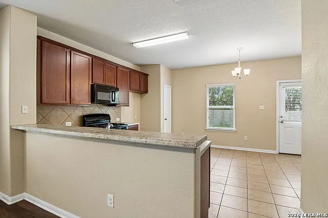 9922 Belmore Cv — Photo 10