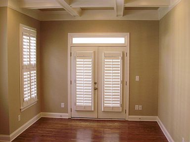 front room with coffered ceiling