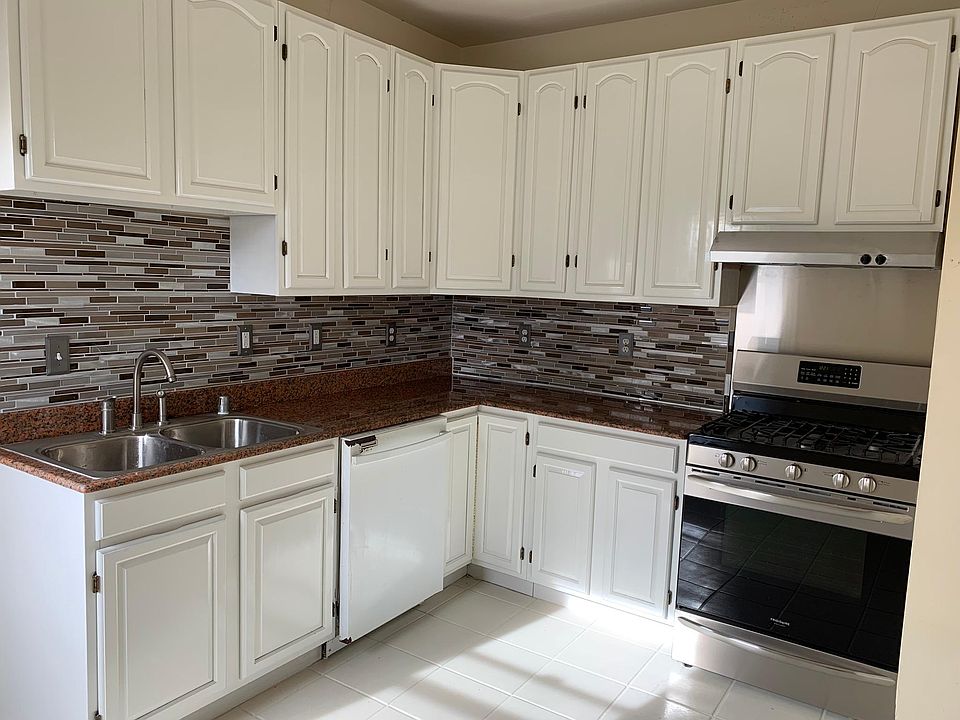 Recently renovated kitchen; updated backsplash gives this room a refreshing energy.