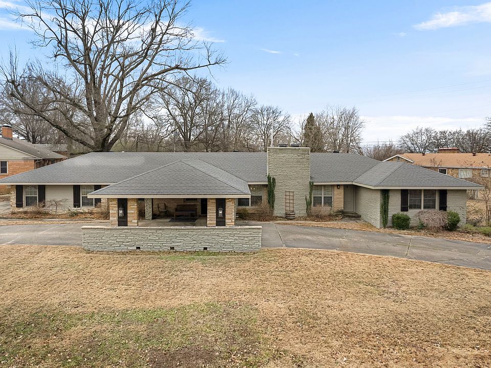 Front of Home, Circle Drive and Car Port.