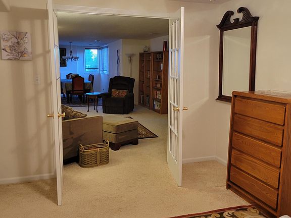 French doors lead to open plan living/dining room.