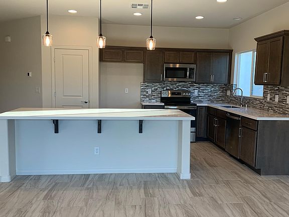 Oversized quartz kitchen island. Great for entertaining!