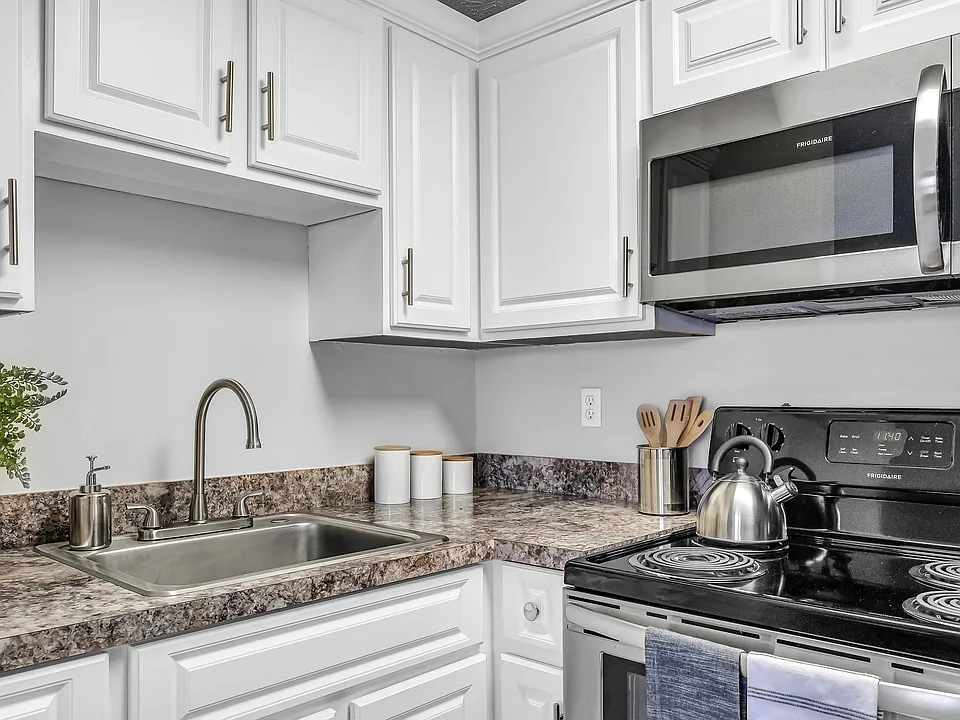Discover a Culinary Haven in Our Modern, Open-Concept Kitchens!