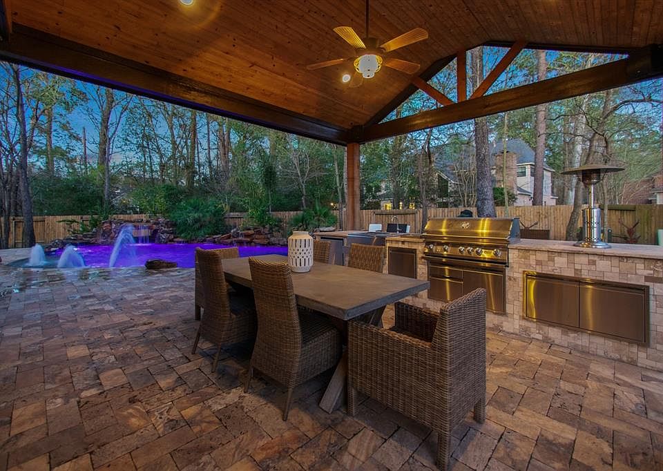 Built in 2016, this summer kitchen will not disappoint with the stainless steel appliances and mosquito misting system. This space is even wired for outdoor entertainment.