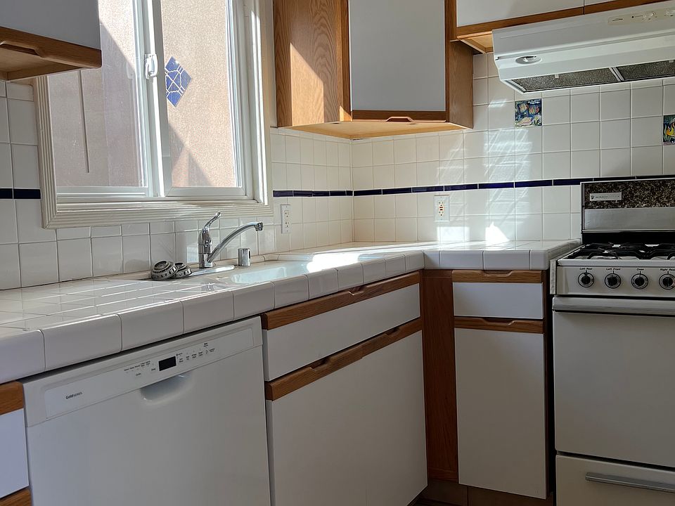 kitchen with stove and dishwasher
