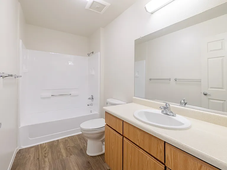 Spacious bathrooms with full tub.