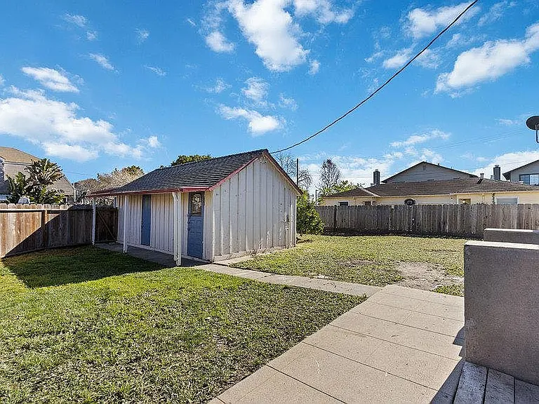 backyard- the small house is going to be turned into a 1 bedroom unit.