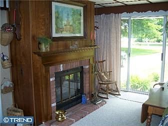 Breezeway w/brick fireplace