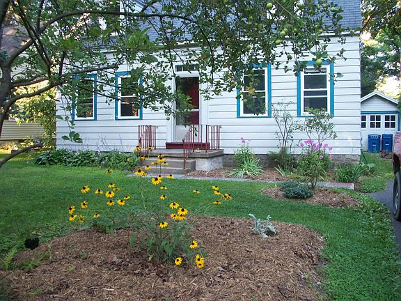 Front yard showing hanging apple branches