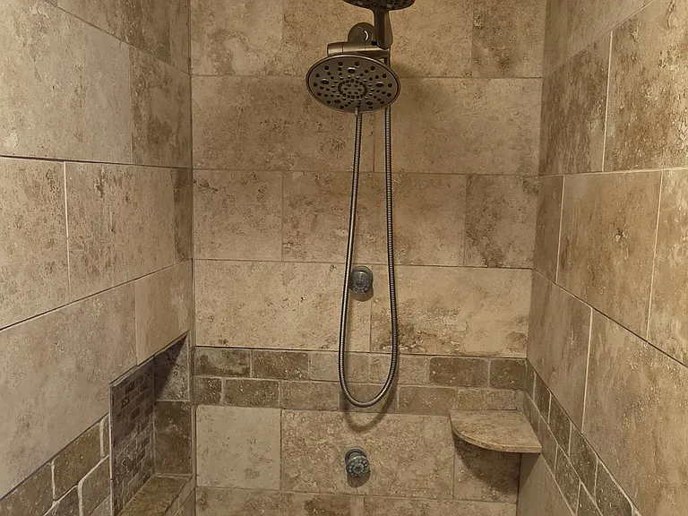 Rain ceiling shower head, two rain heads above the two body sprays.