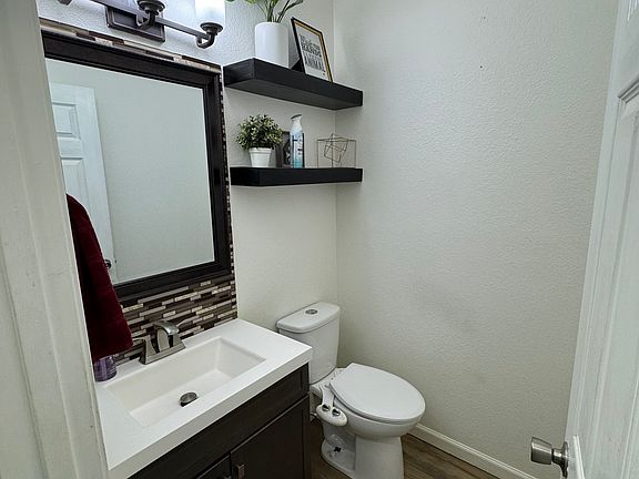 Power room featuring built in shelves